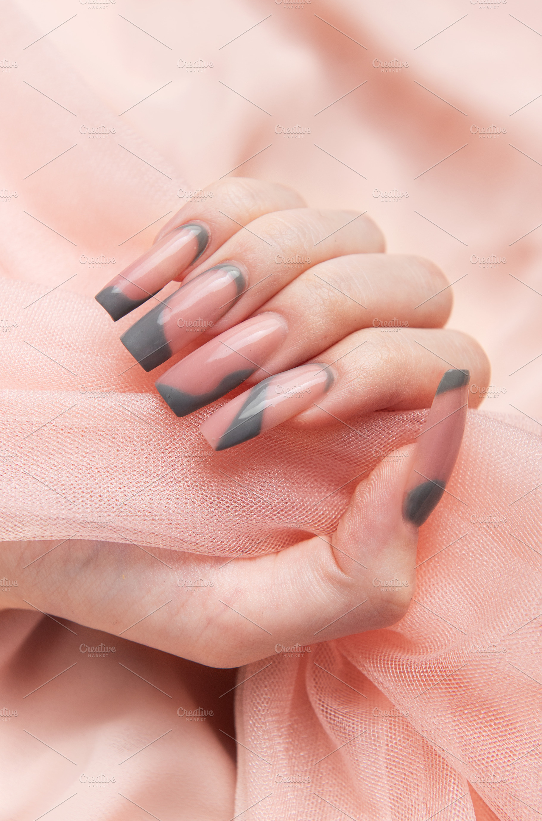 Woman's hand with long pink and gray nail art, a Beauty & Fashion Photo by Olena Rudo