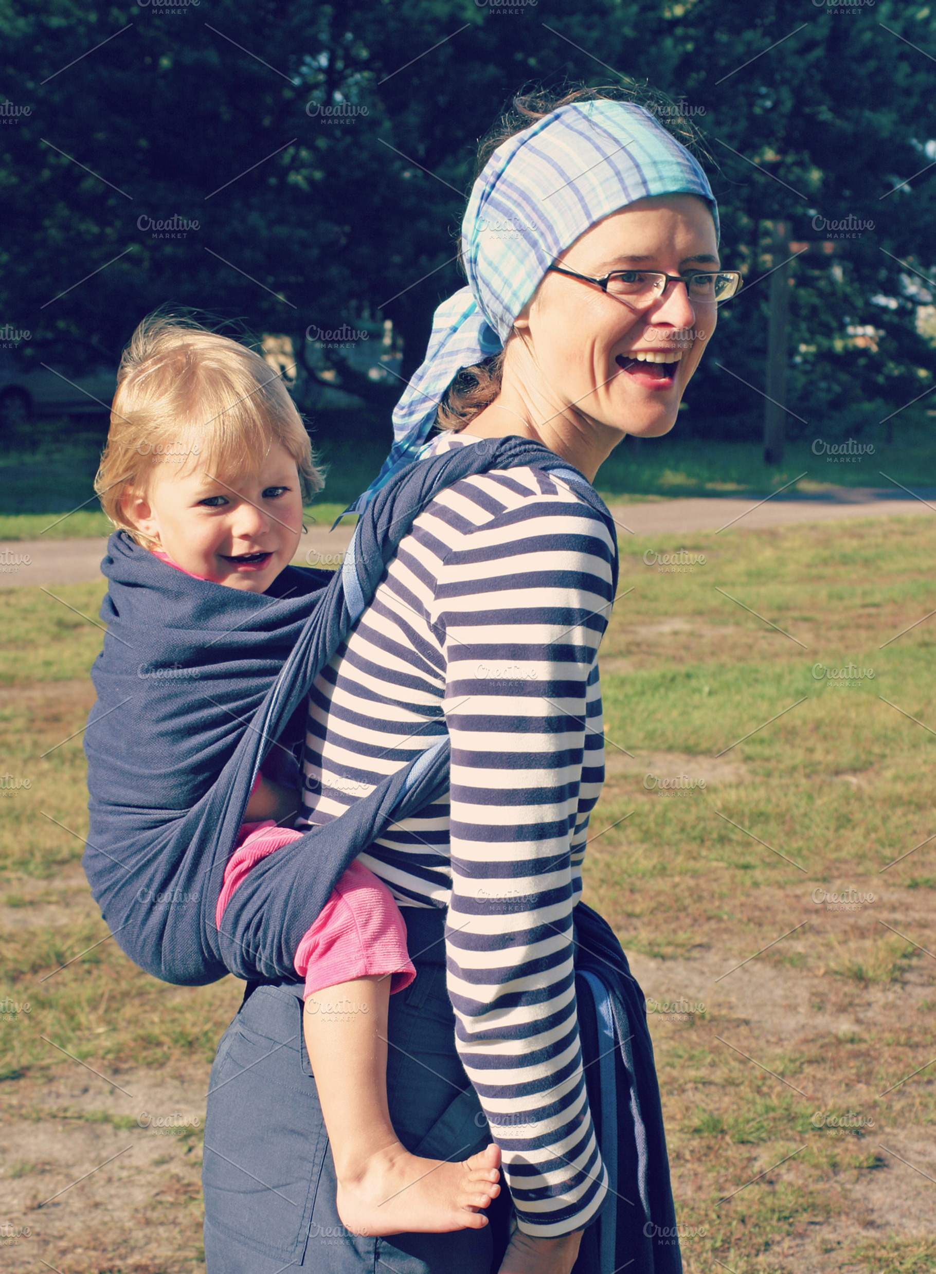 Carrying baby, a Person Photo by BOOCYS