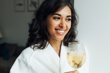 Beautiful cheerful woman with bocal, a Person Photo by Artem Varnitsin