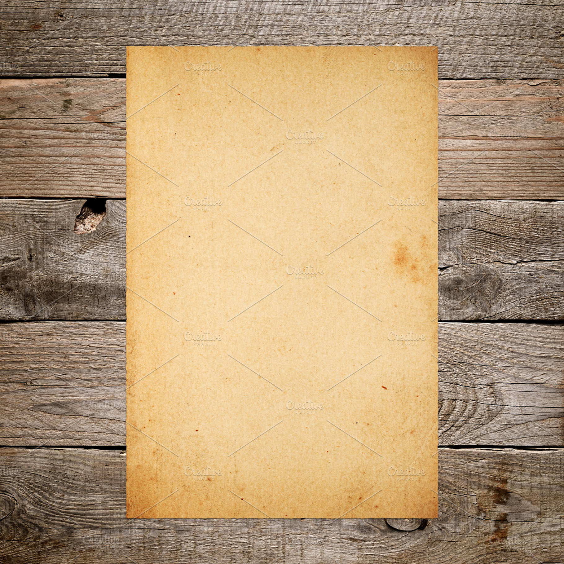 Vintage paper on old wood, an Abstract Photo by Anatoliy Sadovskiy