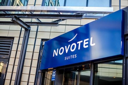 Novotel suites logo at hotel building in Munich, an Architecture Photo by Dvoevnore photos