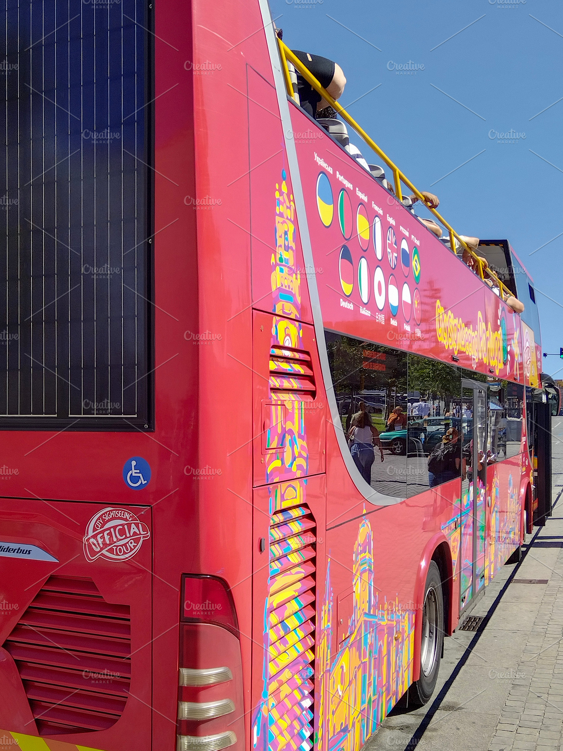 Tourist bus parked under daylight in portugal, a Transportation Photo by DanFLCreativo