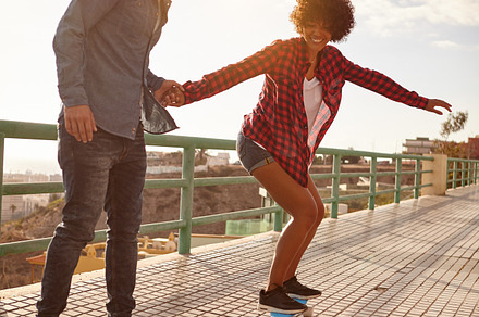 Friends having fun with skateboard stock photo containing girl and skateboard