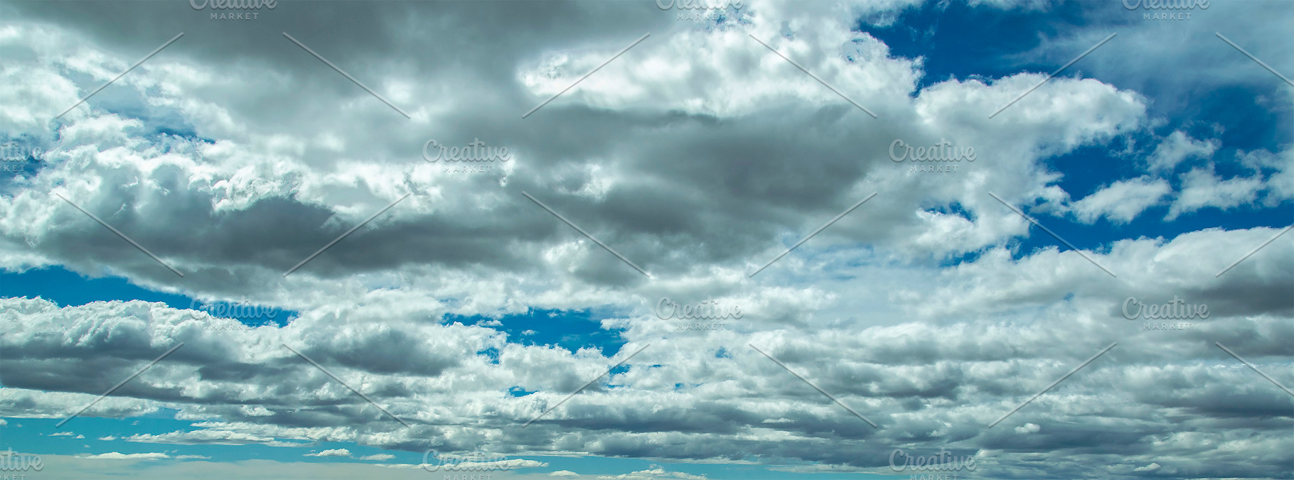 Panoramic cloudscape sky background, a Photo by DanFLCreativo