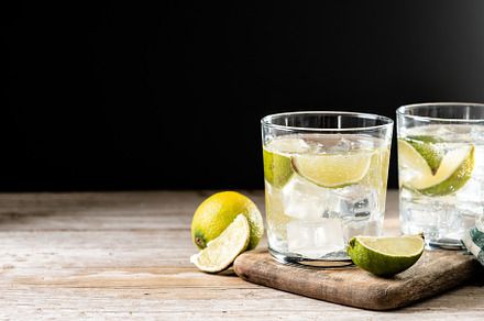 Glass of vodka tonic cocktail on woo, a Food & Drink Photo by etorres69