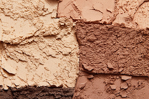 Crushing various shades of powder make up for a cosmetic palette, a Photo by Studio ANNA