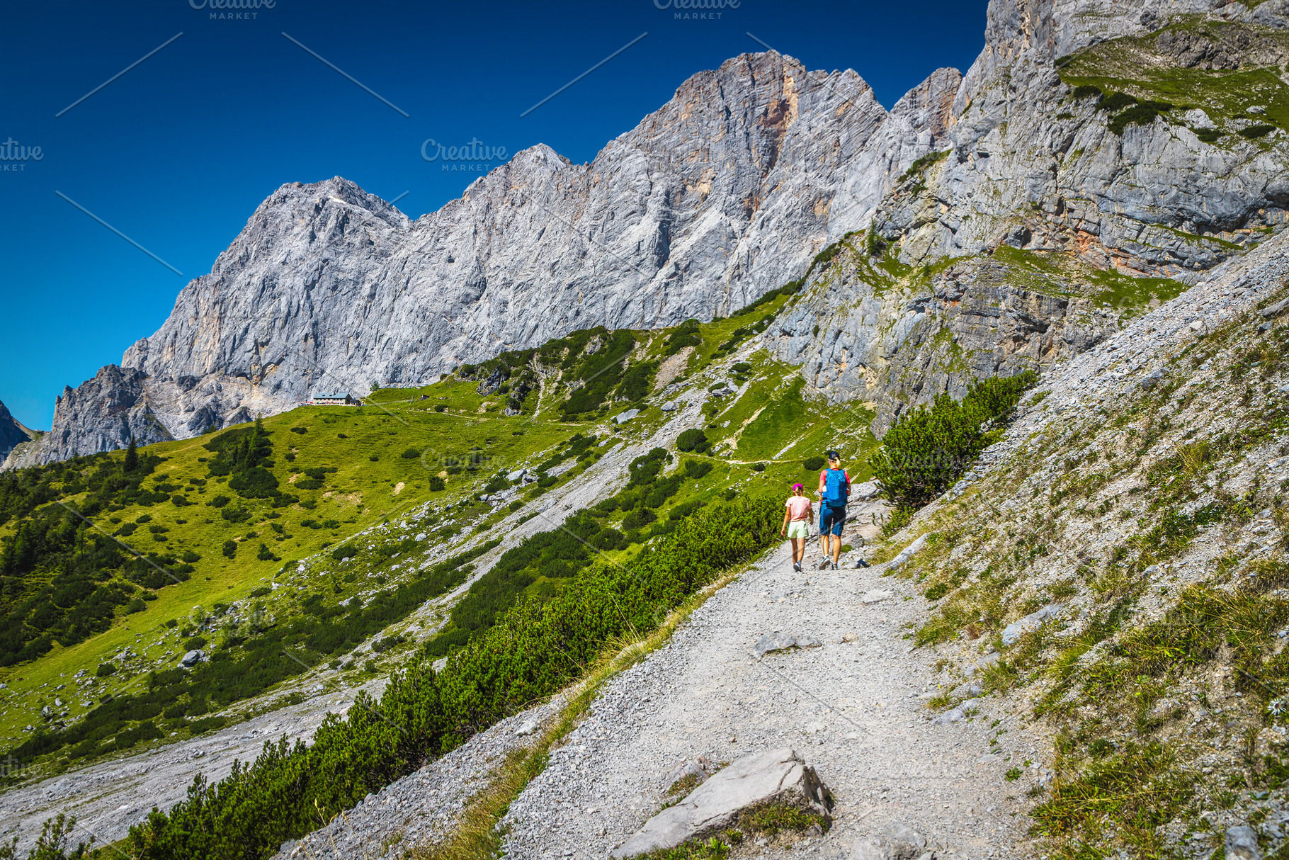 Hikers on the gravelly hiking trail, a Sports & Recreation Photo by Alpine Dreams