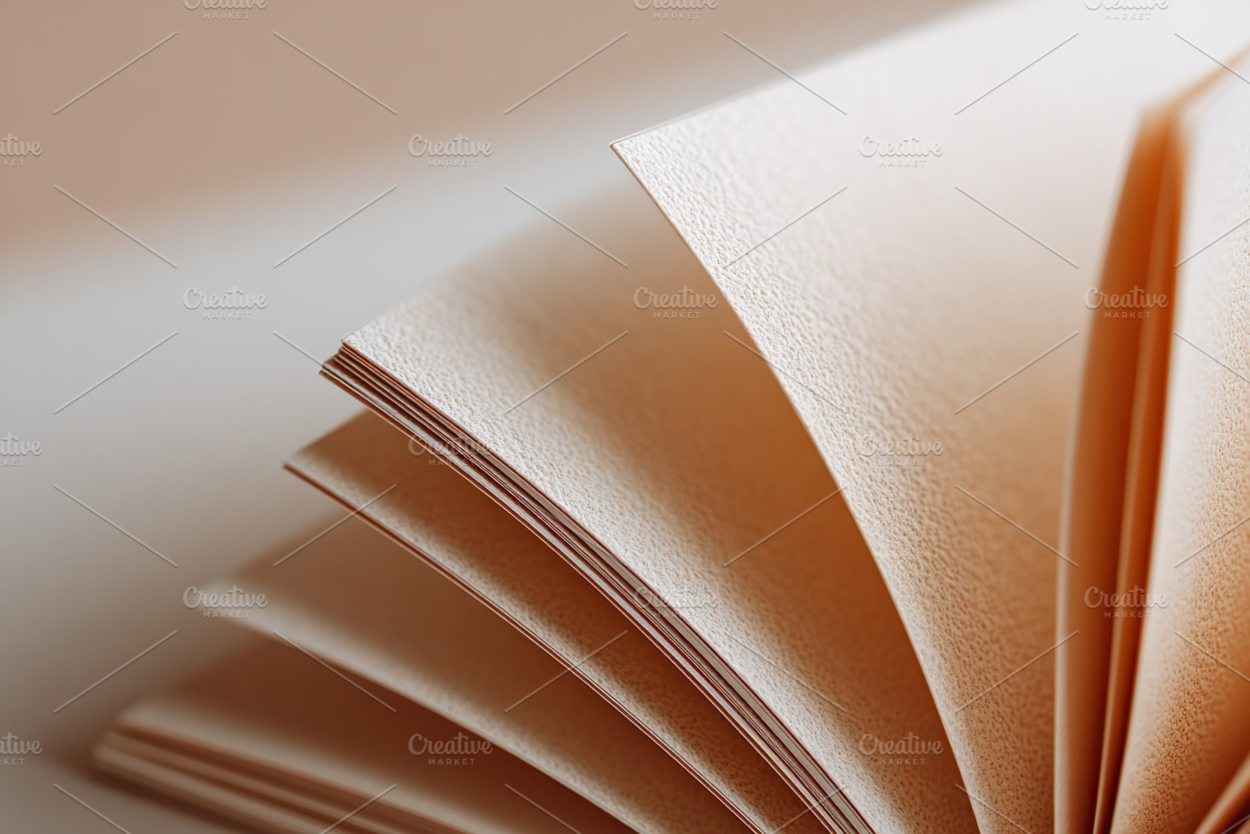Close-up view of a blank open book showcasing its textured pages and binding in, a Photo by AlyaAnd