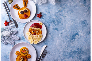 Pancakes in the shape of Santa, a Holiday Photo by Yulia Furman