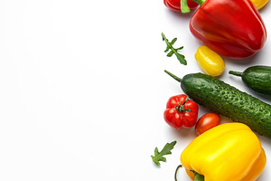 Fresh organic vegetables on white background with copy space, a Food & Drink Photo by Olena Rudo