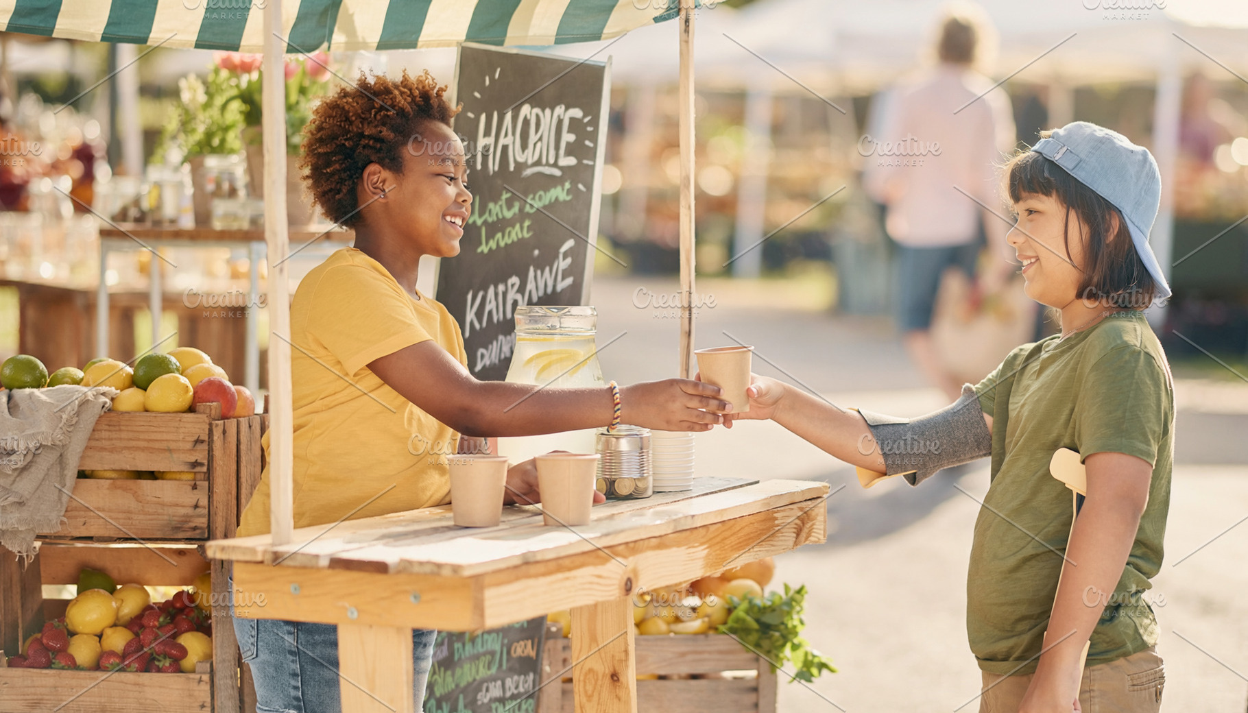 Children interacting at a outdoor wooden lemonade stand market, a Person Photo by DanFLCreativo