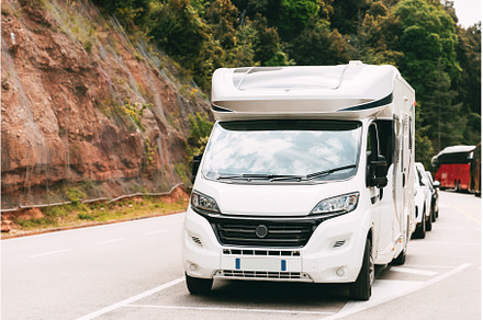 White Colour Motorhome Car Parking, a Transportation Photo by Our Amazing World