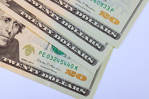 Stack of twenty dollar cash banknote, a Business Photo by Ungvar Studio