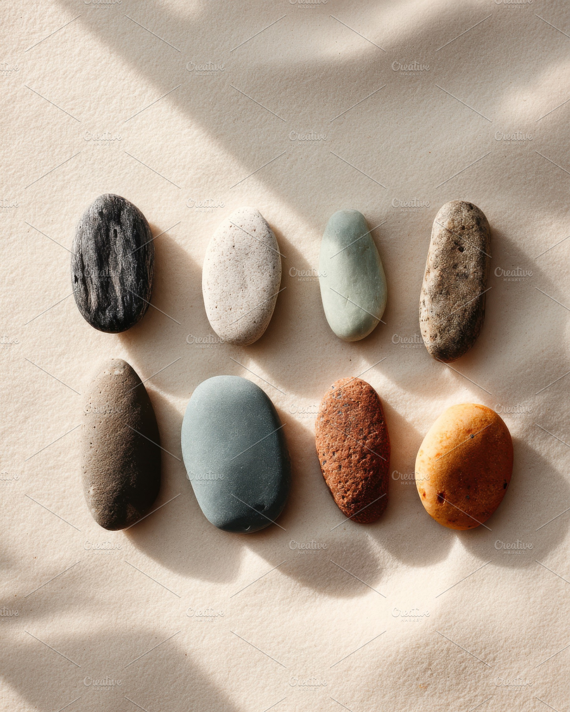 Smooth Pebbles on a Neutral Beach, a Nature Photo by Virgo Studio