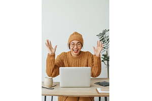 Asian woman excitedly celebrates a, a Technology Photo by Sergey Kotenev