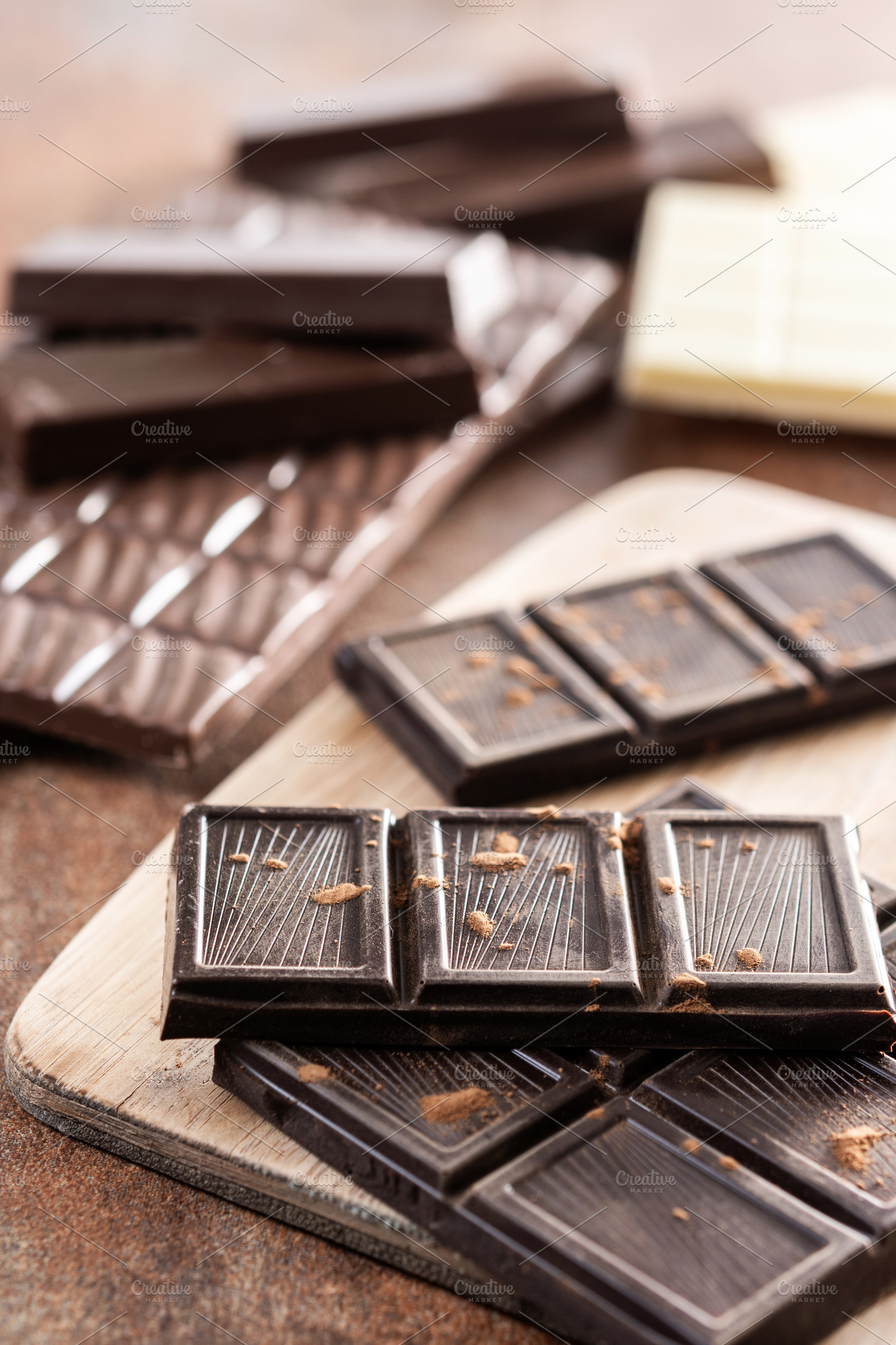 Assortment of white, milk and dark chocolate pieces, a Food & Drink Photo by etorres69