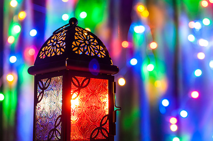 Arabic lantern on colorful light