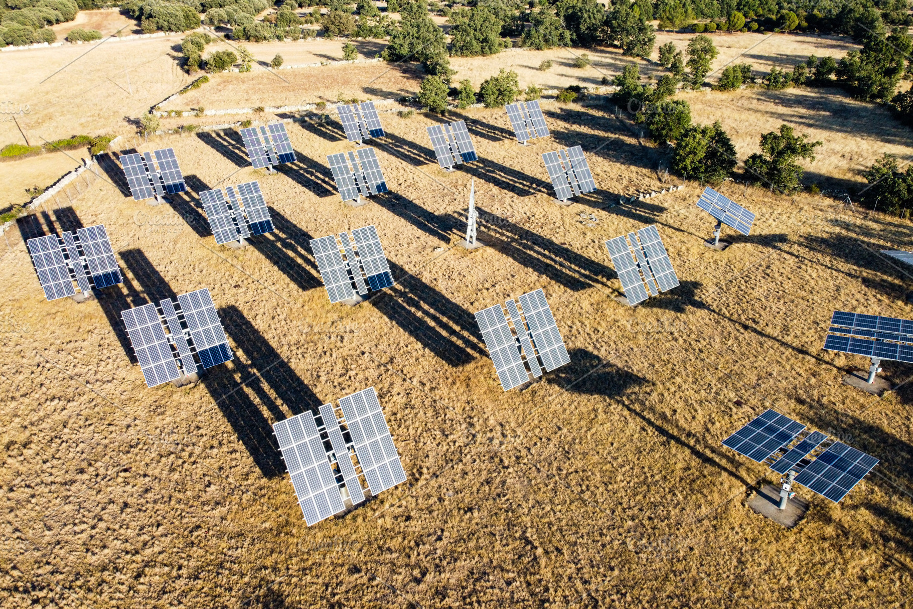 Solar panels in a countryside. Aerial view, an Industrial Photo by Cosca