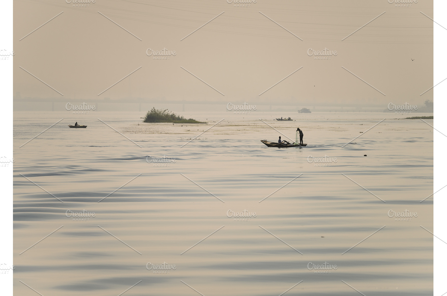 Two men in small wooden fishing boat, a Nature Photo by Backyard Stock