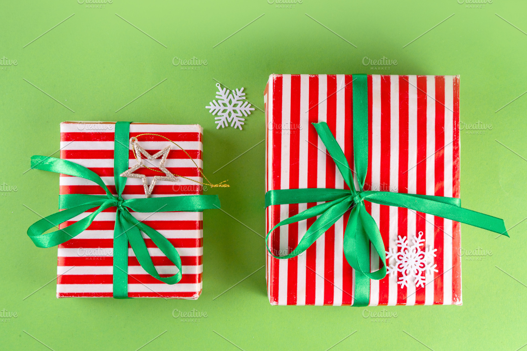 Bright high-colored background with Christmas boxes, festive bau, a Holiday Photo by Rimma
