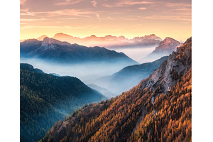 Mountains in low clouds at beautiful, a Nature Photo by den-belitsky