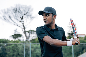 Portrait of a confident tennis, a Sports & Recreation Photo by Artem Varnitsin