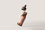 Amber Glass Dropper Bottle Mockups, a Cups & Container Mockup by pmvch (Thumbnail 7 of 20)