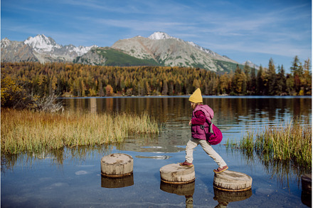 Side view of girl jumping on wooden, a Sports & Recreation Photo by HalfPoint