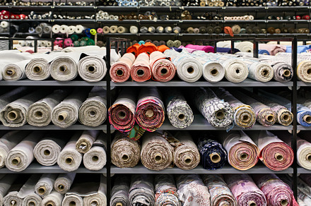 Fabric warehouse with many featuring fabric, warehouse, and shelf