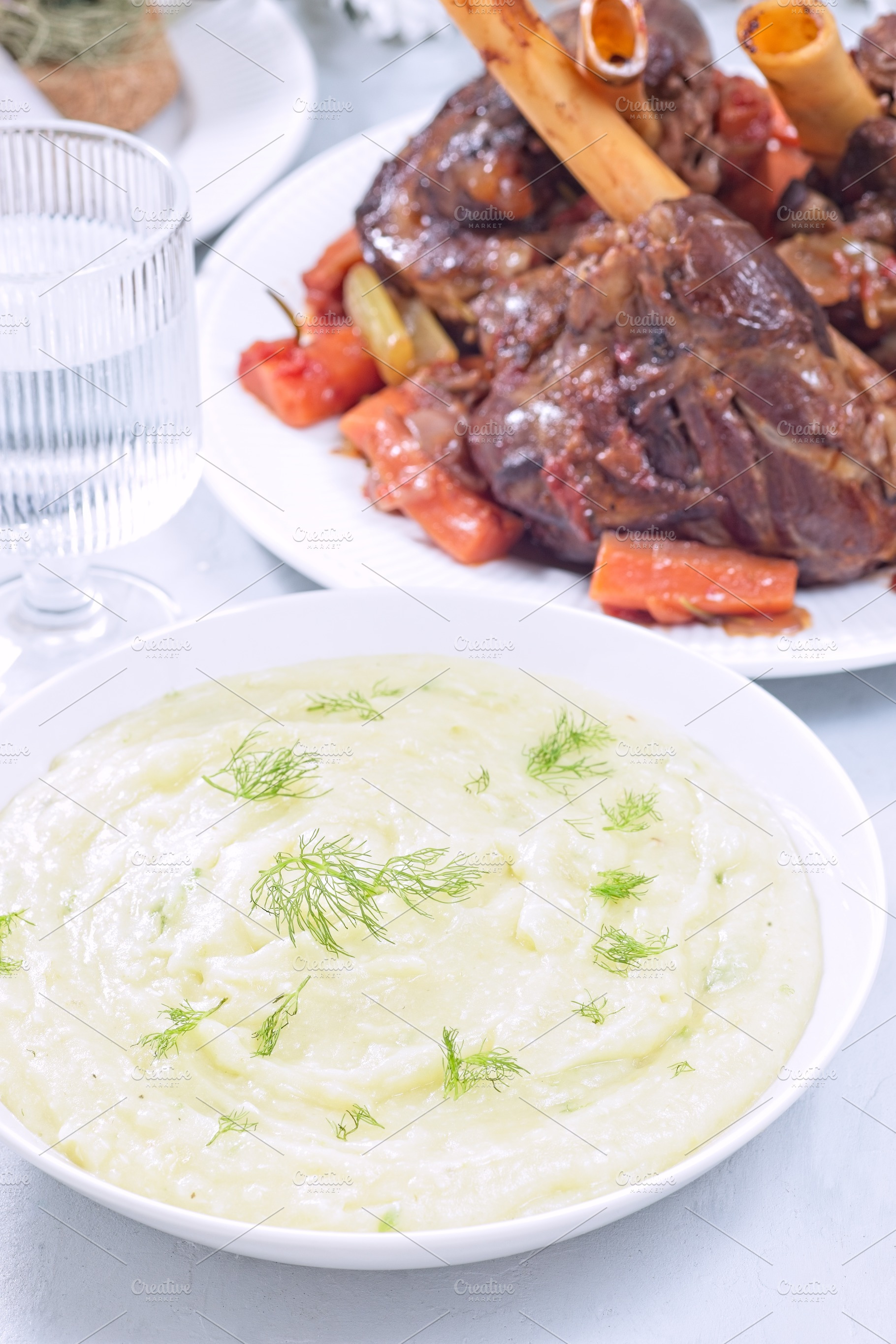 Horseradish and fennel puree or mashed potatoes with braised lamb shanks in bac, a Food & Drink Photo by iuliia_n