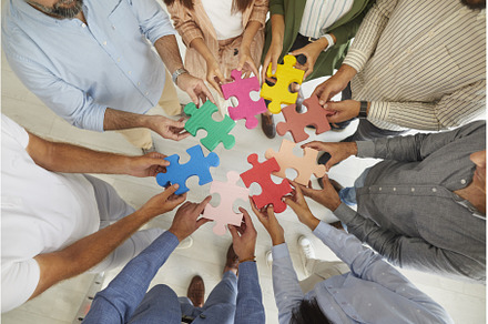 Team of business people connecting, a Business Photo by StudioRomantic