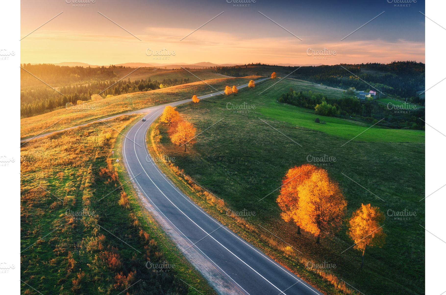 Aerial view of winding road in, a Nature Photo by den-belitsky