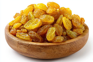 Golden raisins in a wooden bowl heal, a Photo by Pixeness Studio