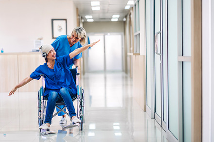 Professional medical doctor with stethoscope in uniform discussi, a Person Photo by Art_Photo