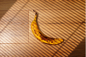A bright yellow banana with brown, a Food & Drink Photo by darksoul72