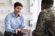 depressed military guy standing next to window, closeup, a Photo by Prostock-Studio (Thumbnail 2 of 3)