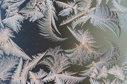 Frosty patterns on the window glass featuring pattern, frosty, and window