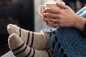 Woman's Hands Holding Steaming Mug, a Person Photo by Virgo Studio