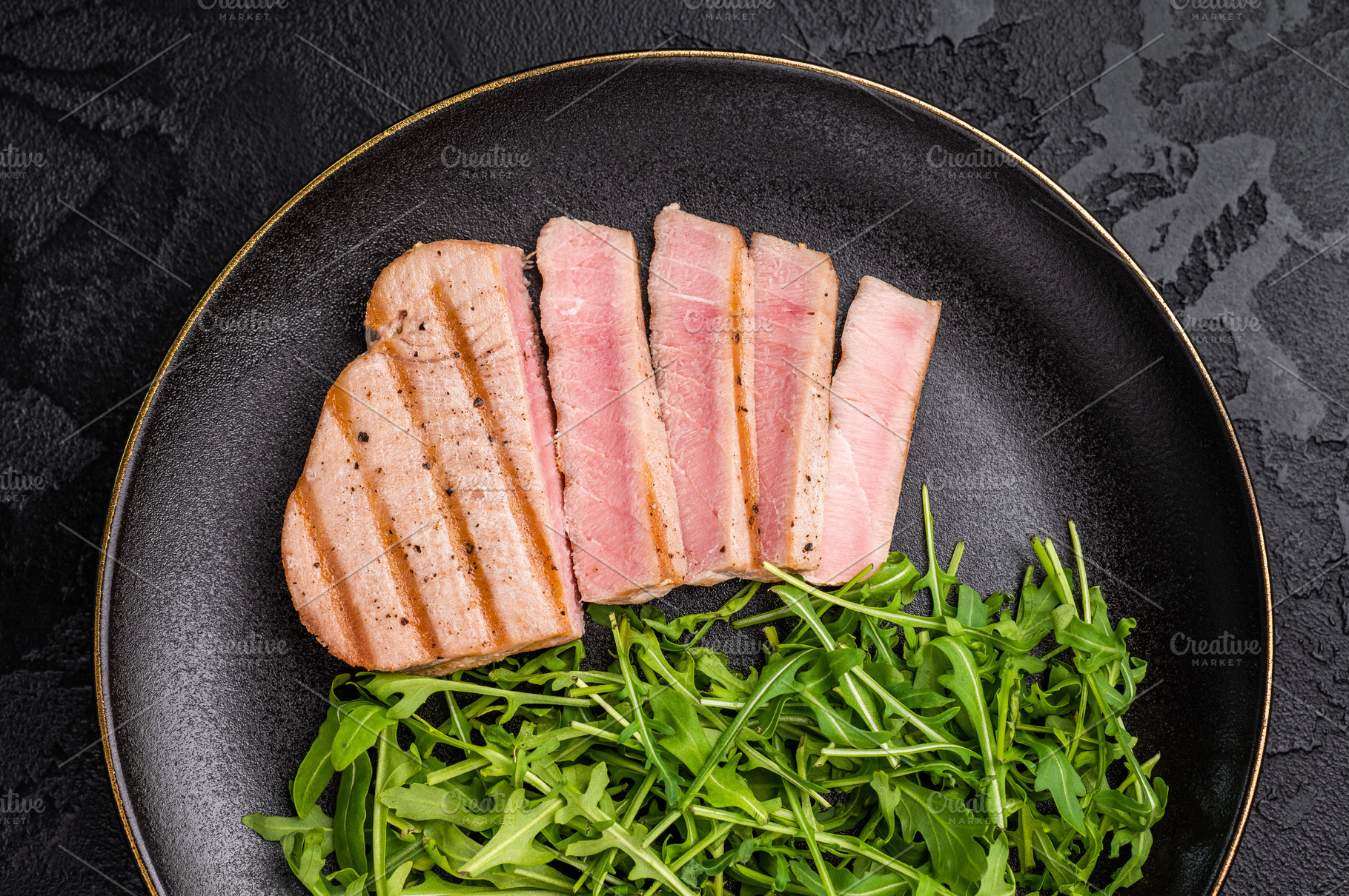 Succulent grilled tuna steak, showcasing vibrant color and rich, a Food & Drink Photo by composter-box@mail.ru