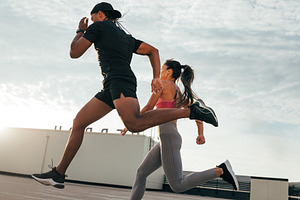 Fitness couple running and jumping, a Sports & Recreation Photo by Artem Varnitsin