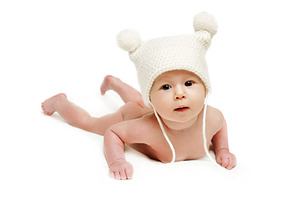 Newborn baby in the cap, a Photo by saiko3p