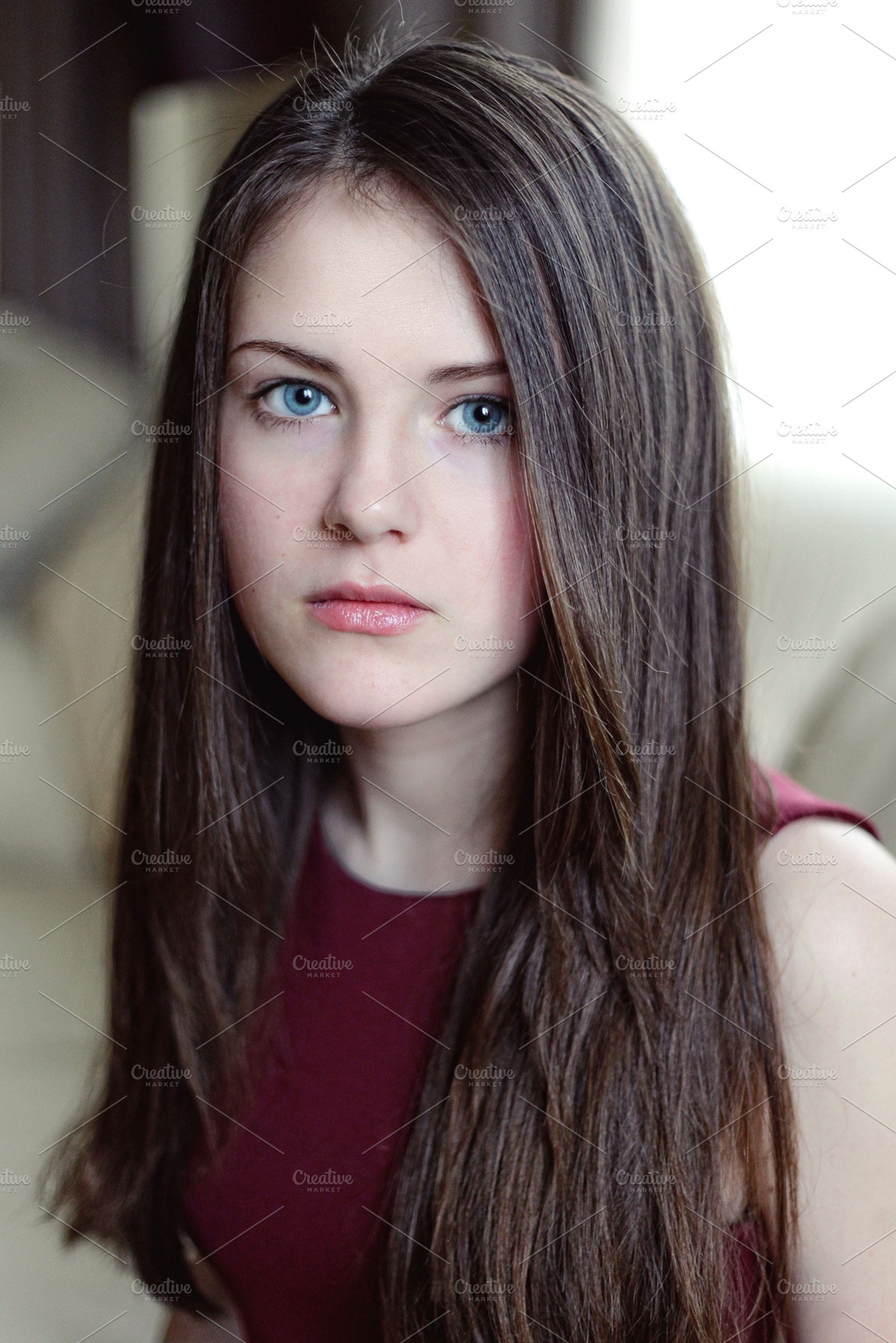 Beautiful young girl with long hair containing sofa, clear, and model, a Person Photo by AlinLyre