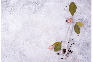 Culinary background with pepper, bay, a Food & Drink Photo by Yulia Furman