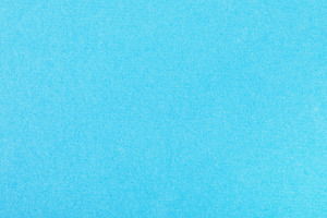 Bright blue paper texture with soft, even color and subtle grain, a Background Photo by Ales Munt