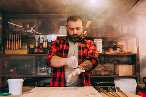Joinery workshop industrial safety carpenter glove, a Person Photo by Photo Drive Studio