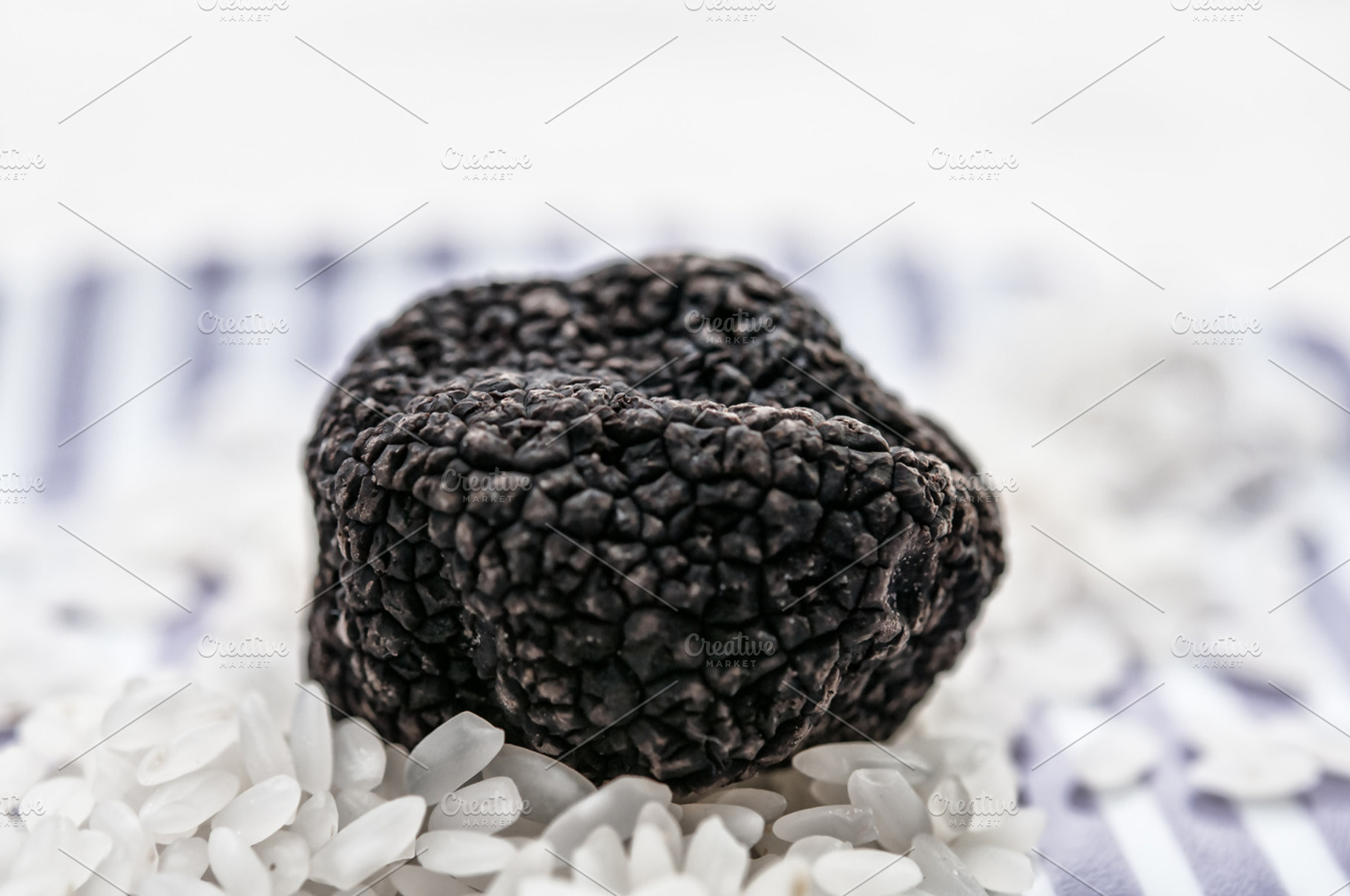 mushrooms black truffle on a plate w, a Food & Drink Photo by OXYMORON 