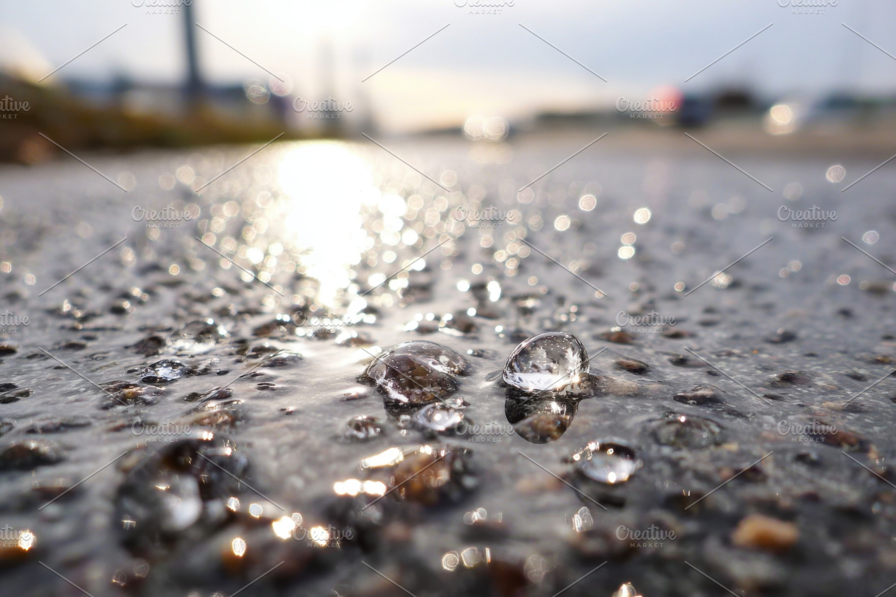 Sparkling water droplets on a surface in black and white, a Background Photo by AlyaAnd
