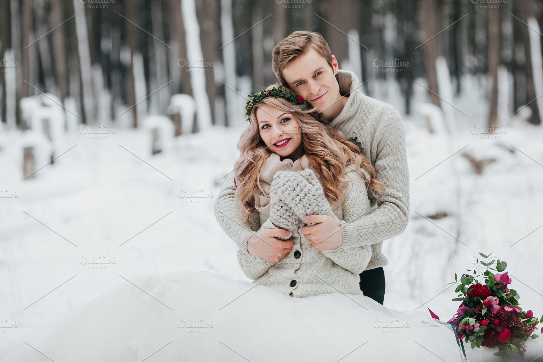 Newlyweds are hugging in the winter forest couple in love winter wedding, a Person Photo by Stahov