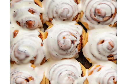 Homemade cinnamon buns in glaze, a Food & Drink Photo by yanadjana