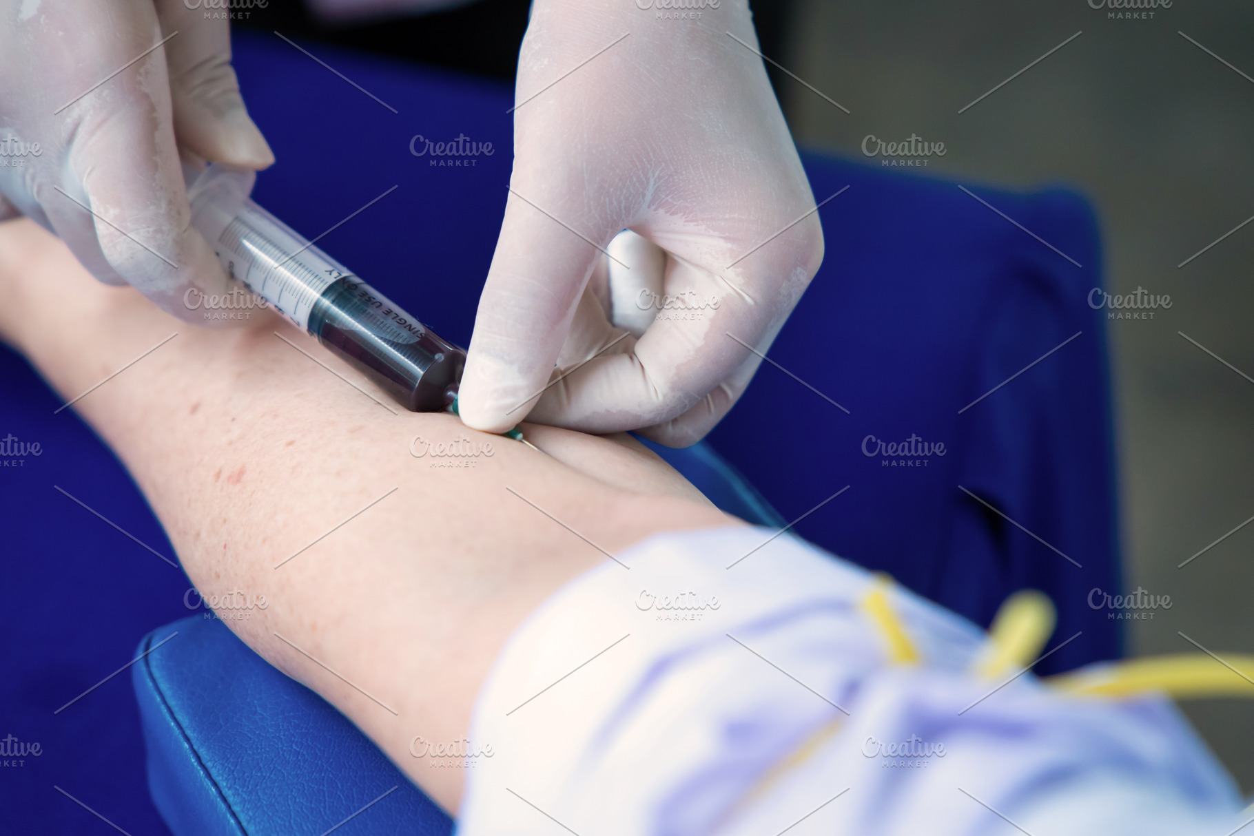 Close up hand collecting blood sample for diagnosis and treatmen, a Health & Medical Photo by Casanowe-studio